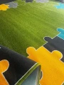 zdjęcie, fragment,  zielony dywan szkolny, dywan przedszkolny,  dywan fit puzzle zielony , powierzchnia i spód