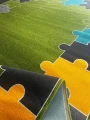 zdjęcie, fragment,  zielony dywan szkolny, dywan przedszkolny,  dywan fit puzzle zielony , powierzchnia i  spód